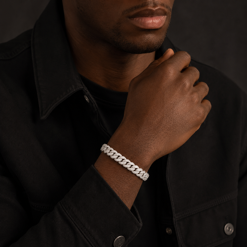 Moissanite Miami Cuban link bracelet in 925 sterling silver with rhodium plating, worn on a wrist.