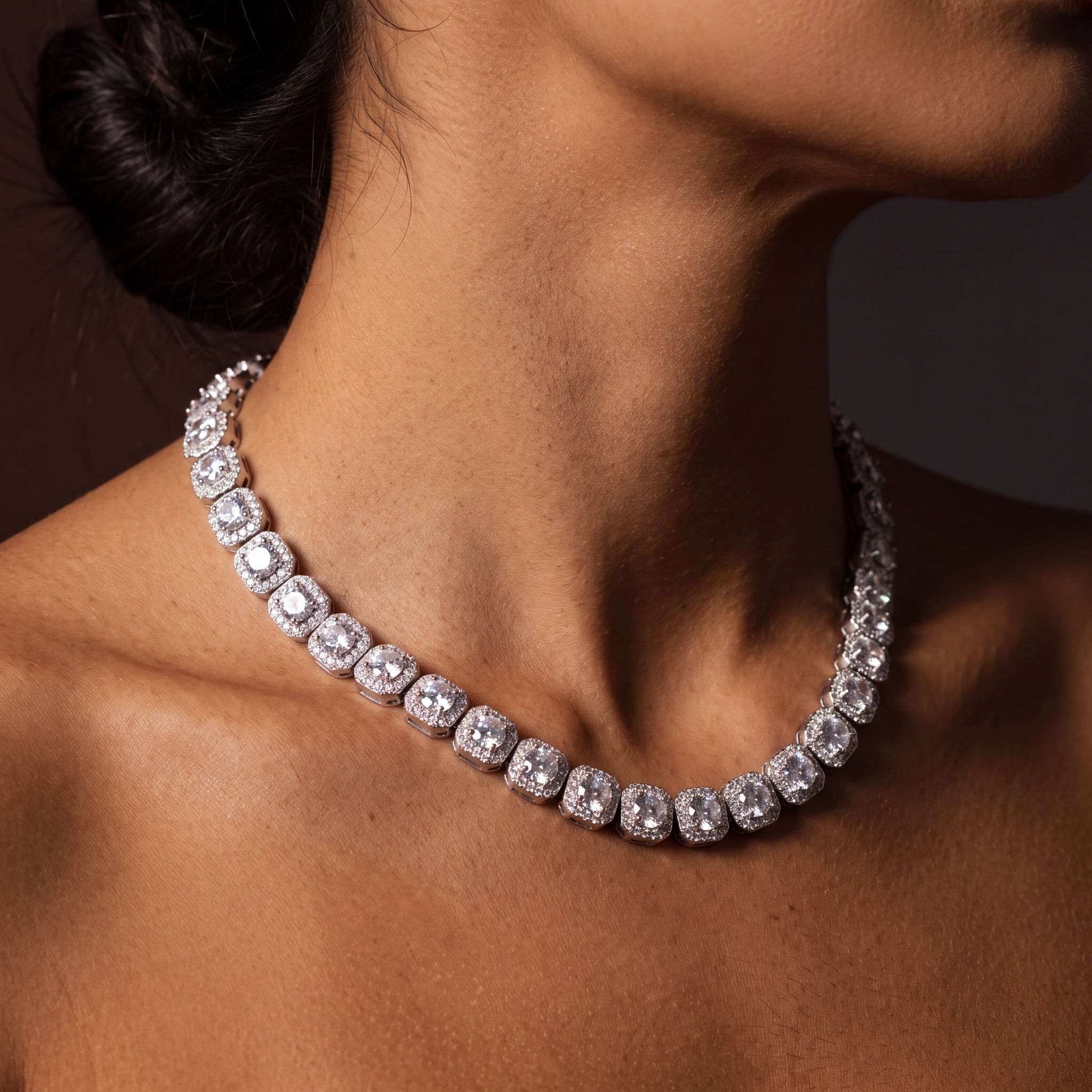 Clustered tennis chain with halo cluster stations worn on the neck, second model