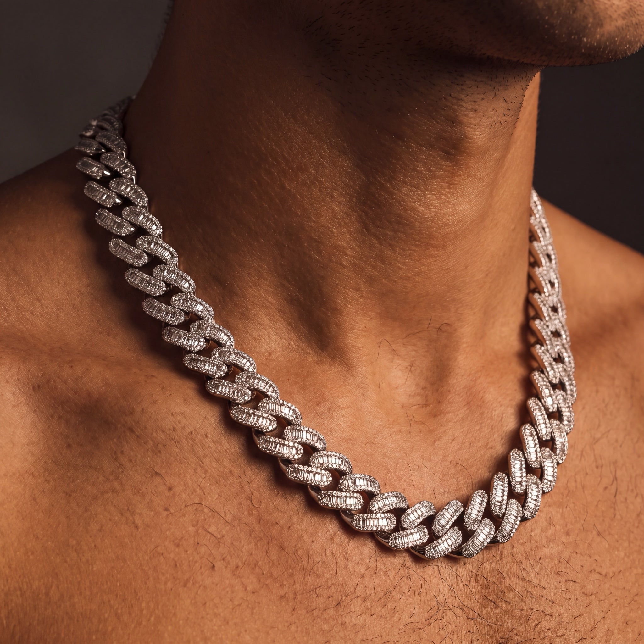15 mm baguette iced Cuban link chain worn in a lifestyle setting