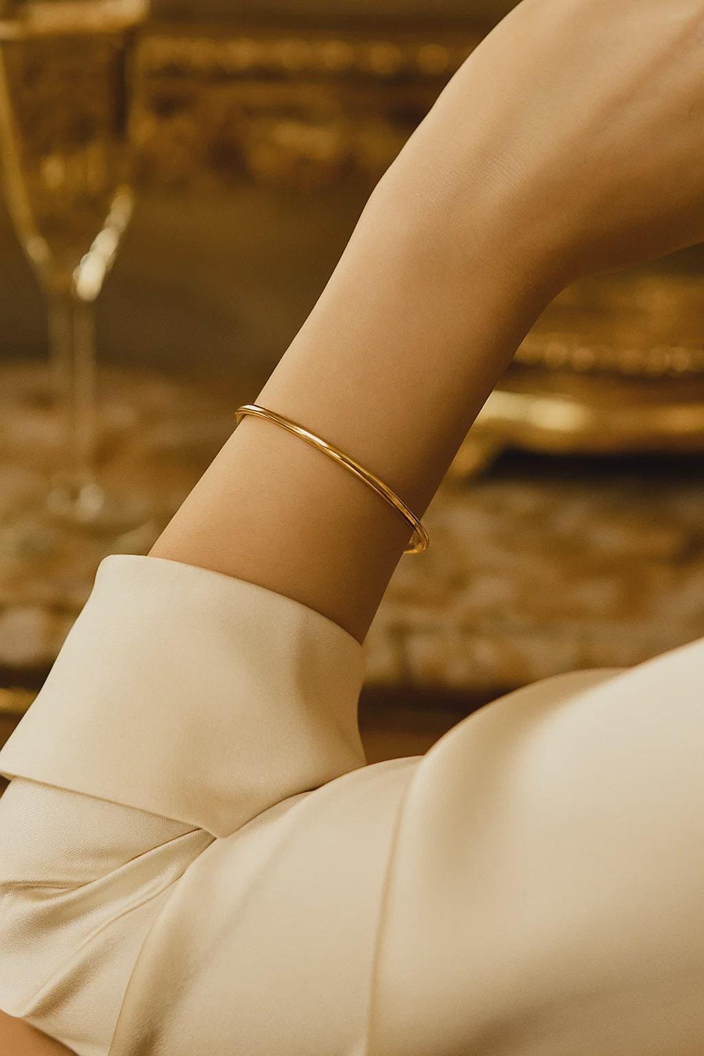 Thin round gold bangle, tarnish-resistant high-polish finish