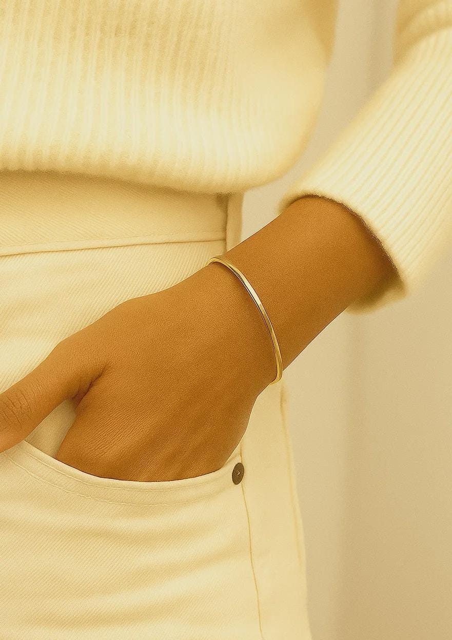 Thin round gold bangle, tarnish-resistant high-polish finish