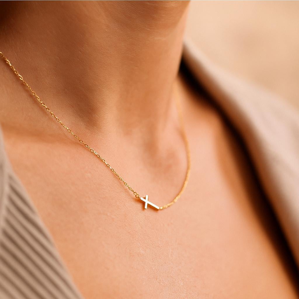 Sideways cross pendant with 18K PVD gold plating